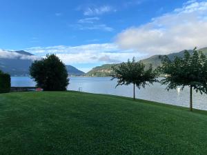 Bellissimo appartamento con giardino sul lago di Lugano