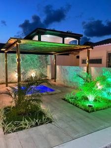 Casa com Piscina Jacuzi e Salão de Jogos