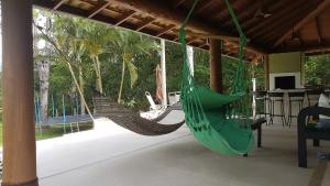 Casa na Praia Mole de Frente para Lagoa da Conceição - Paraíso - Pé na Areia - Condominio Privativo