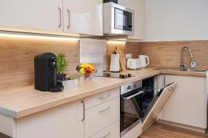 Appartements ONLOC - St Exupery -Magnifique appart au calme avec chambre - parking : photos des chambres