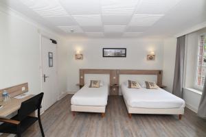 Hotels Logis Hotel du Commerce : photos des chambres