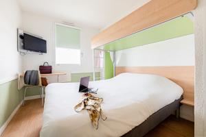 Hotels ibis budget Carcassonne Aeroport - A61 : photos des chambres