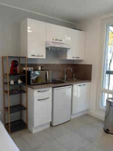 Appartements Studio Cosy avec garage prive : photos des chambres