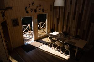 MĖLYNOJO KARPIO PIRTIES NAMAS