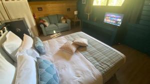 Chalets Domaine Vallon des Ocres : photos des chambres