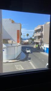 Balcón y sol en Arguineguín