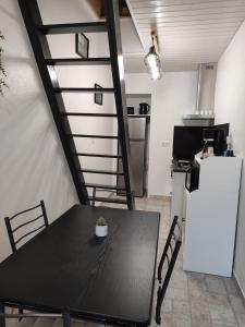 Appartements L'ENTRE-TEMPS : photos des chambres