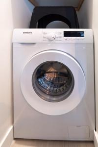 Appartements La WAIDE Beau studio centre ville WIFI NETFLIX tout equipe : photos des chambres