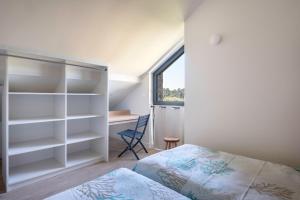 Maisons de vacances Superbe maison dans un parc boise a 5 min a pieds de la mer : photos des chambres