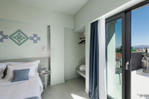 Superior Double with City View Upper Floor room in Arkadi Hotel