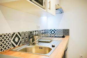 Appartements Les studios propres et tout equipes : photos des chambres