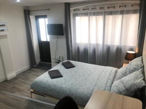 Jolis Appartements au coeur de Clermont Ferrand - Proche Jaude - WIFI et NETFLIX : photos des chambres