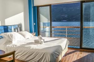 Maisons de vacances Feet in the water! : photos des chambres