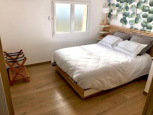 Appartements La Parenthese Balneo T2 Cosy de 40m² avec terrasse : photos des chambres