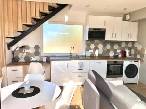 Appartements La Parenthese Balneo T2 Cosy de 40m² avec terrasse : photos des chambres