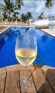 APARTAMENTO À BEIRA MAR - PÉ NA AREIA - Ilhéus