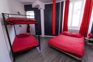 Appartements Au nid douillet - Dormir Comme A La Maison : photos des chambres