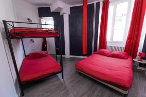 Appartements Au nid douillet - Dormir Comme A La Maison : photos des chambres