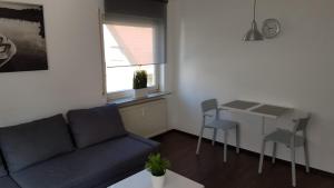 Ferien- und Businessapartment I Modern mit WLAN und Parkplatz nahe Zentrum, Automobil- und Tech-Firmen, Messe