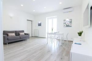 FOUR WHITE APARTMENTS