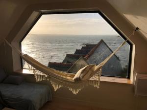 Appartements Magnifique vue mer, dans un petit appartement. : photos des chambres