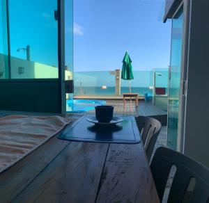 Triplex pé na areia