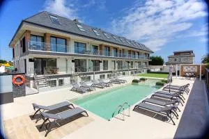 Viviendas Vacacionales ENTREPLAYAS Foz - Fazouro