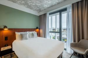 Hotels KYRIAD LYON OUEST Limonest : photos des chambres