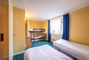 Three-Bedroom Apartment room in Atlantic Apartotel