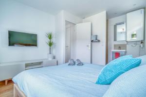 Appartements TOP 2P NEUF tout equipe avec WIFI proche Paris : photos des chambres