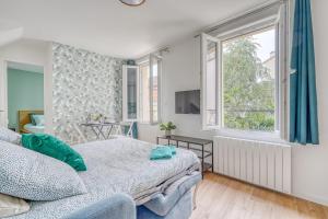 Appartements TOP 2P NEUF tout equipe avec WIFI proche Paris : photos des chambres