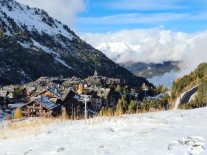 Appartements Arc 1950 Appartement de standing Refuge du Montagnard, vue incroyable sur le Montblanc, skis aux pieds Acces spa et piscine : photos des chambres