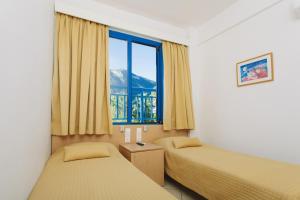 Family Room with Side Sea View room in HOTEL SISSY