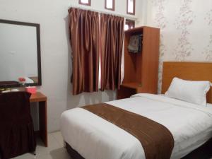 Hotel Belangi Syariah Taakengon Mitra RedDoorz