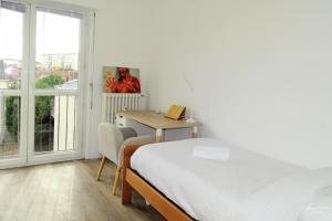 Appartements House Of Joy - Centre ville - Parking gratuit : photos des chambres