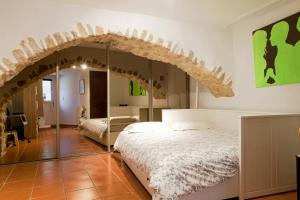 Maisons de vacances Gite urbain les jardins de la meyne : photos des chambres