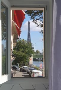 Appartements Loft 5 places with view on Eiffel Tower : photos des chambres