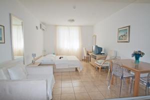 Family Apartment (2 Adults + 2 Children) room in Apartments Tamarix
