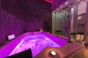 Appartements Appart’Detente *JACUZZI *HAMMAM*SAUNA* : photos des chambres