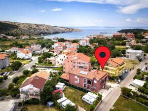 Apartment in Lopar with balcony, air conditioning, WiFi, washing machine (4885-1)