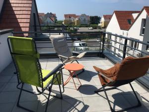 Appartements Appartement Le Golf : photos des chambres