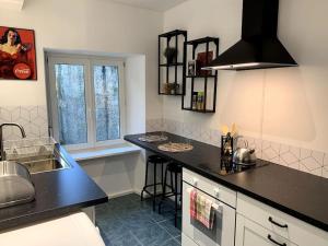 Appartements L'Atelier - T1 pres de la gare de Mulhouse : photos des chambres