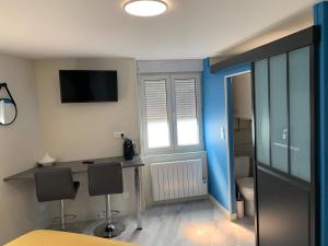 Appartements Le Petit Bleu Centre ville - Wifi - Parking : photos des chambres