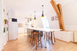 Appartements Le Chic de Serre : photos des chambres