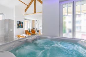 Appartements Relax Spa, avec jacuzzi a Dijon : photos des chambres