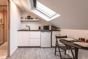 Appartements Le Coquet Logement Climatise face a la Cathedrale - 3G : photos des chambres