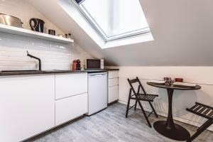 Appartements Le Coquet Logement Climatise face a la Cathedrale - 3G : photos des chambres