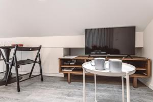 Appartements Le Coquet Logement Climatise face a la Cathedrale - 3G : photos des chambres