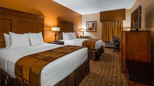Queen Room with Two Queen Beds room in Best Western Plus Midwest Inn & Suites
