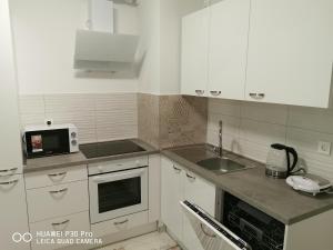 CITY CENTER PEARL #new#free reserved parking in garage elevator direct access#business and pleasure# 